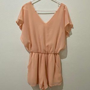 Blush pink flutter sleeve romper